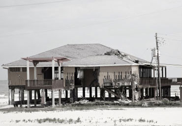 Wind damage - spray foam can help prevent uplift to Elgin roofs